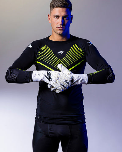 boy wearing junior white kaliaaer goalkeeper gloves