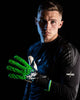 Person wearing kaliaaer goalkeeper gloves in green 