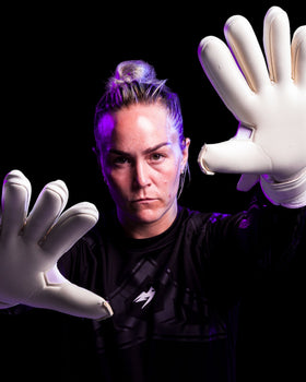 A person showing the palms of kaliaaer nitropro neg goalkeeper gloves