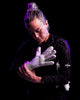 A person trying on kaliaaer white goalie gloves