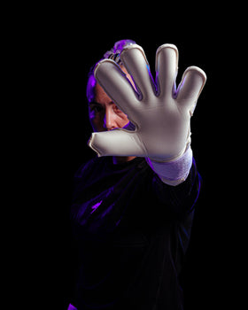 A person showing the palm of kaliaaer PWRpro goalkeeper gloves