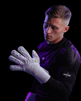 A person looking at the backhand of the kaliaaer pwrpro goalkeeper gloves