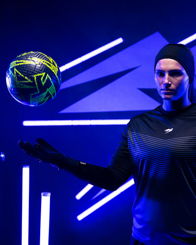 A person throwing the Kaliaaer Reactaer neo football.