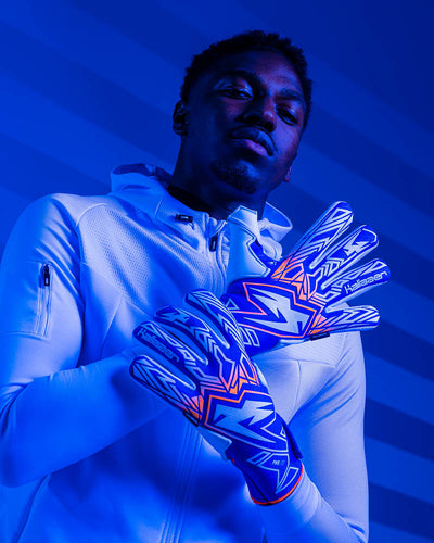 person holding up kaliaaer azure touch feel goalkeeper gloves