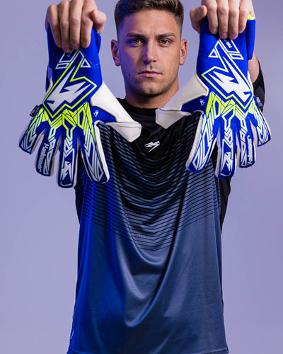 man holding up Junior Sekure Kaliaaer Goalkeeper Gloves