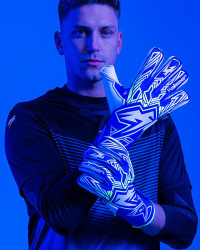 Person holding wrist of kaliaaer azure goalkeeper gloves 