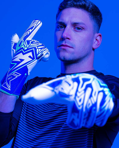 Man wearing Kaliaaer Goalkeeper gloves pointing finger