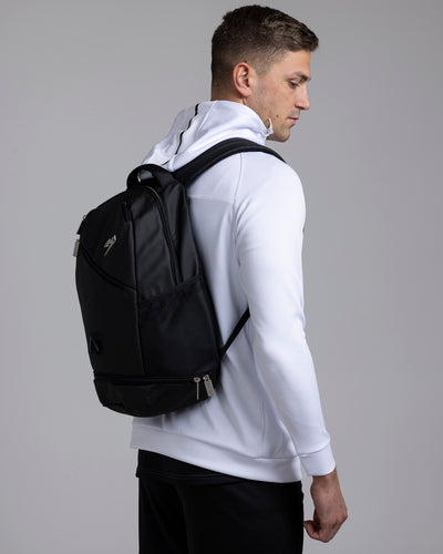 A person wearing the Kaliaaer Pro Backpack.