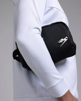 A person carrying the Kaliaaer Pro Glove Wash Bag.