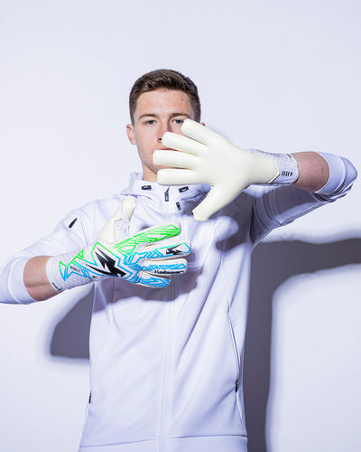 Boy showing kaliaaer strapless green and blue goalkeeper gloves