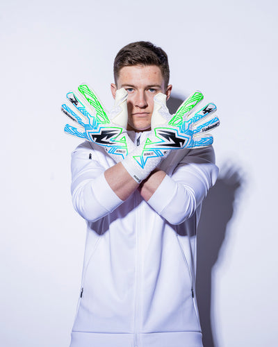 man wearing kaliaaer strapless green and blue goalkeeper gloves