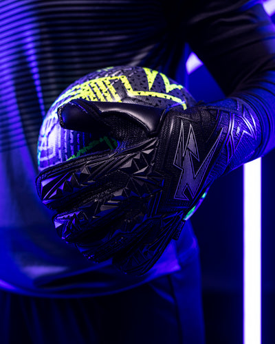 A person holding the Kaliaaer Reactaer neo football.