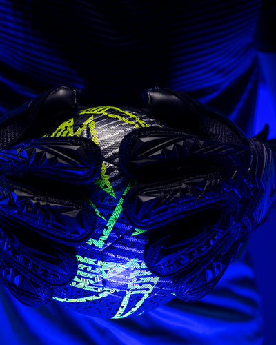 A person holding the Kaliaaer Reactaer neo football.