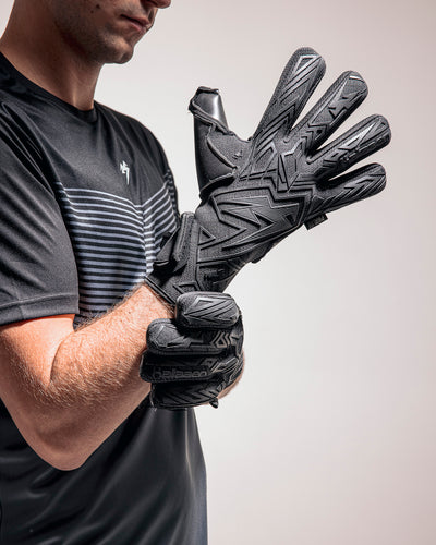 person wearing kaliaaer black neg cut goalie gloves