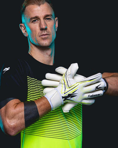 Joe Hart wearing White and Neo Goalkeeper holds pushes palms together